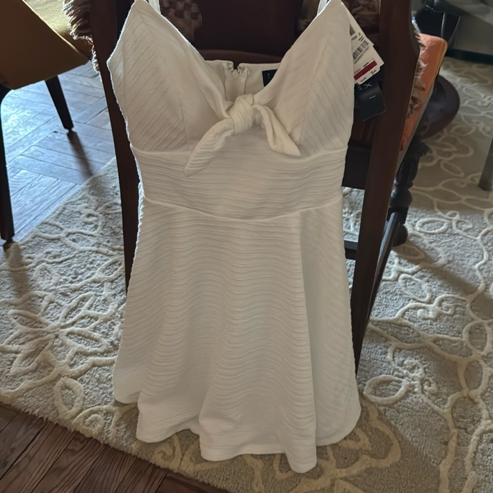Trixxi white bowed dressed with skater skirt bottom